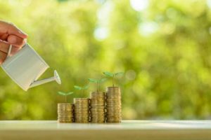 Watering Can on Money